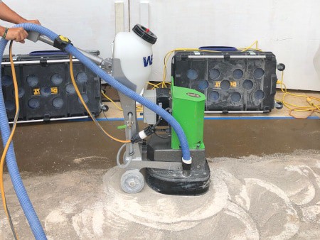 The Ritz-Carlton Spa, Waikiki, stone floor undergoing cleaning services.