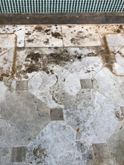 Stone damage in Mediterranean Courtyard.