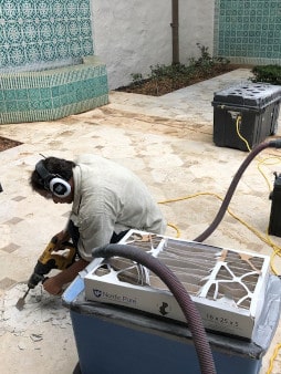 Repair stone in Meditarrean Courtyard.