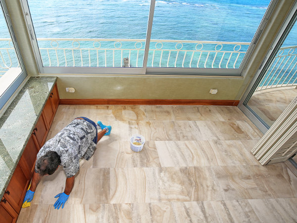 Resurface, clean, and seal limestone floor.